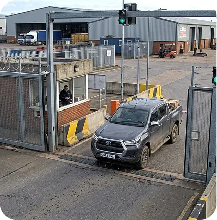 Vehicle entering a secured facility gate